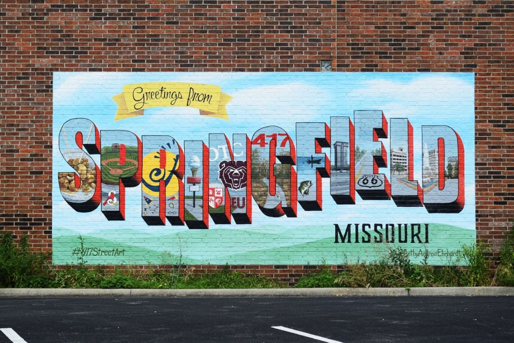 A painted sign for Springfield, MO